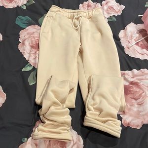 tan stacked sweats